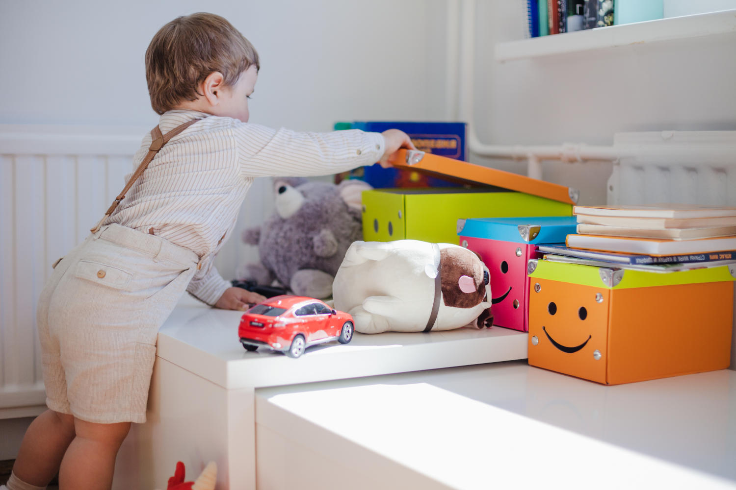 little-boy-opening-box-with-toys.jpg