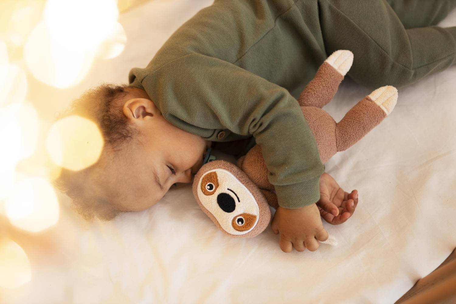 top-view-baby-with-stuffed-toy.jpg